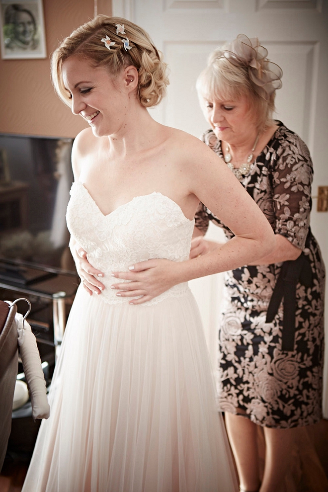 Loving this gorgeous Bride's getting ready photos in her blush wedding dress!