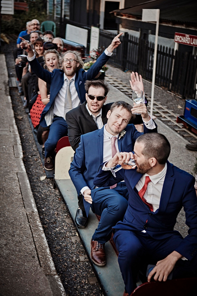 What a fun shot of the Groomsmen at the train museum for the DIY reception!