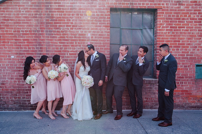 Loving this fun shot of the Bridal Party and Bride and Groom on their big day!