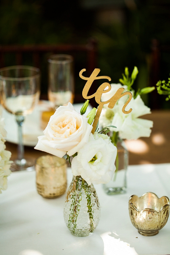 We're swooning over these gorgeous centerpiece and table numbers!