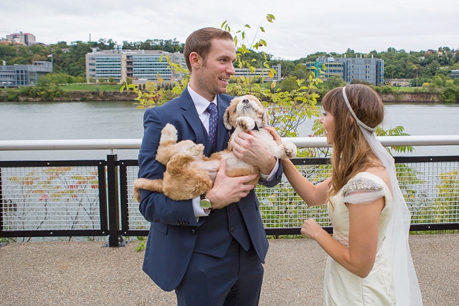 We're loving this hilarious shot of the Bride and Groom with their pup! So cute!