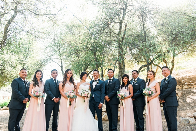 Gorgeous bridal party with the new Mr. and Mrs. after this gorgeous ceremony!