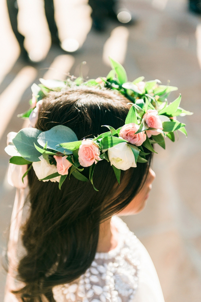 How darling is this flower girl in her gorgeous flower crown?! So cute!