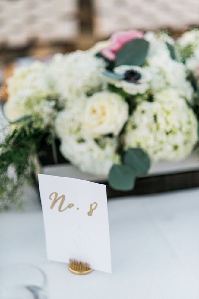 Loving all of the gold details in these DIY wedding! The handlettered gold table numbers are the perfect touch!