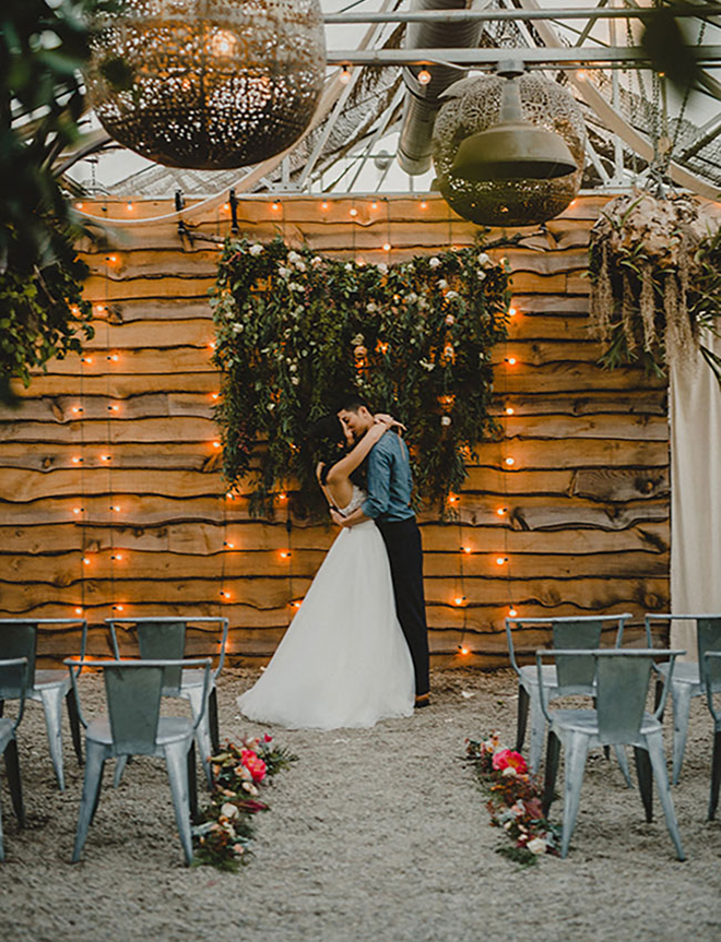 We love this romantic rustic garden ceremony backdrop!