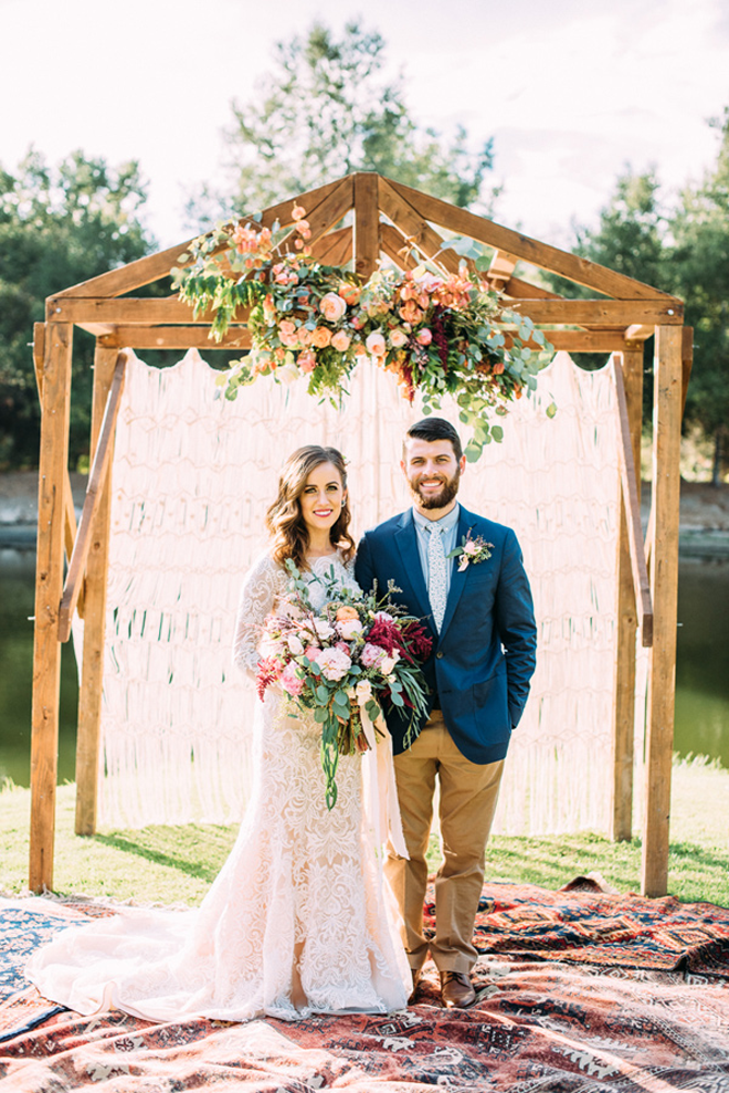 Loving this boho floral inspired treehouse wedding ceremony backdrop!