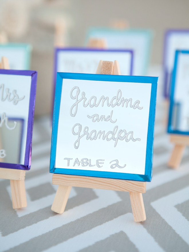 How to make the most darling mini-mirror and easel escort card display!