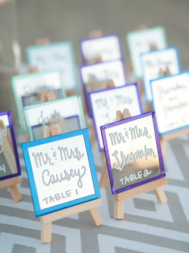 How to make the most darling mini-mirror and easel escort card display!