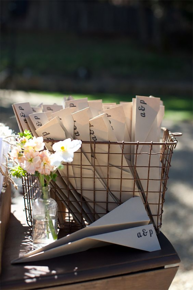 add a little masculinity and humor to your paper goods with paper airplane folded programs