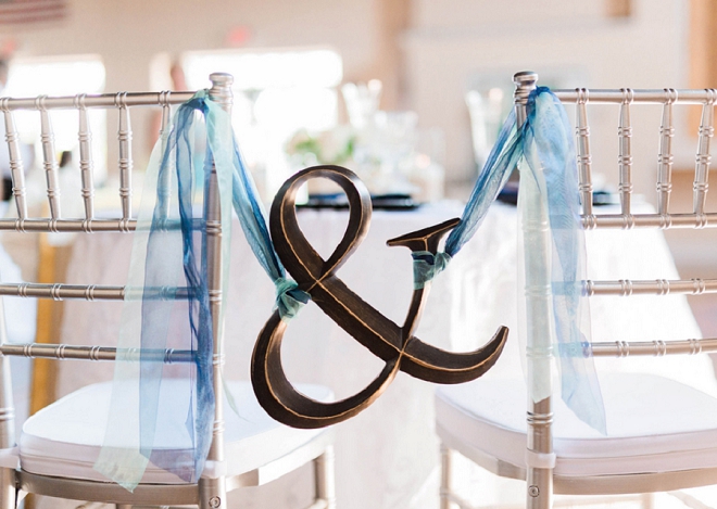 We love this sweet Mr. and Mrs. chair sign at this gorgeous wedding!