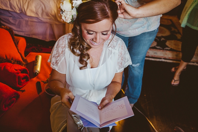 Such a sweet snap of the Bride reading her card from her Groom! Swoon!