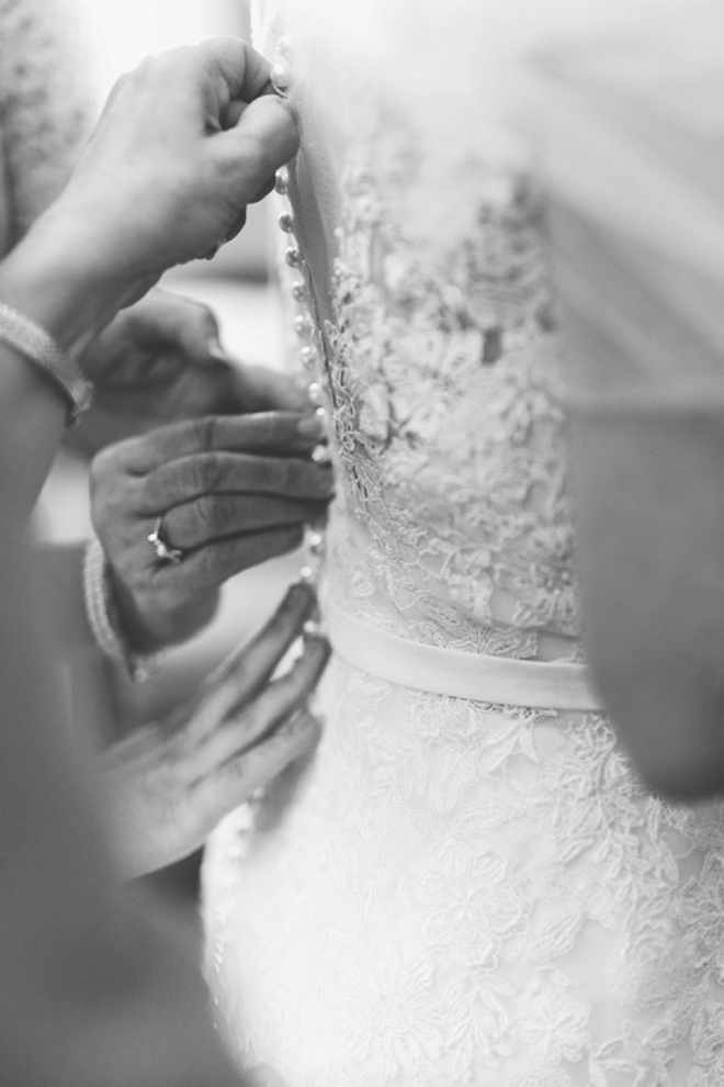 We're crushing on this gorgeous shot of the Bride getting ready for the big day!
