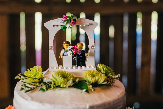 We're loving this fun couple's wedding cake and darling cake topper!