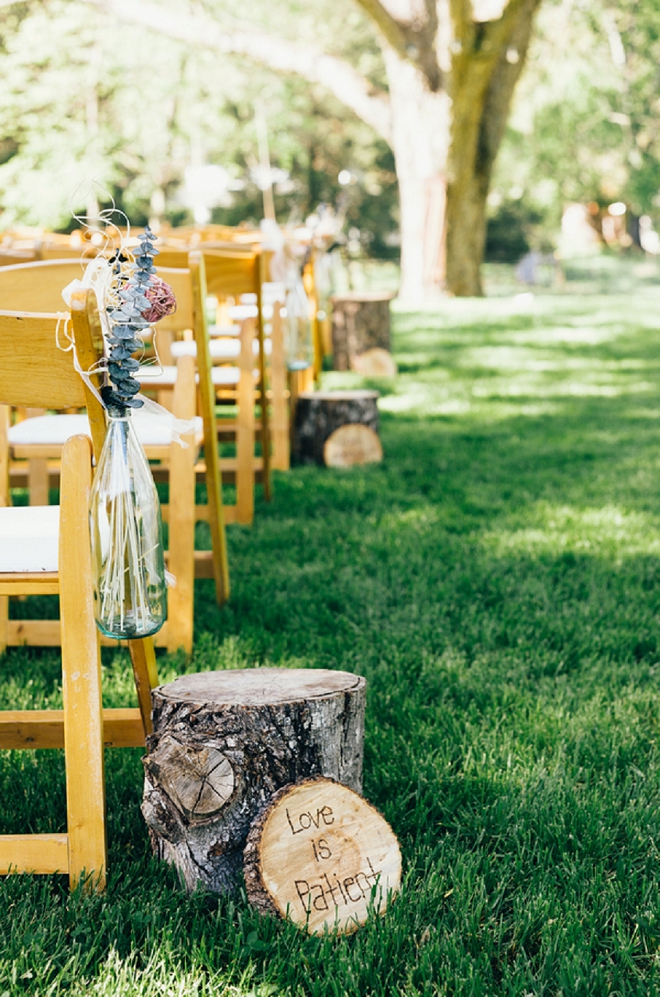 We LOVE the wooden bible versus this couple had down their ceremony aisle!