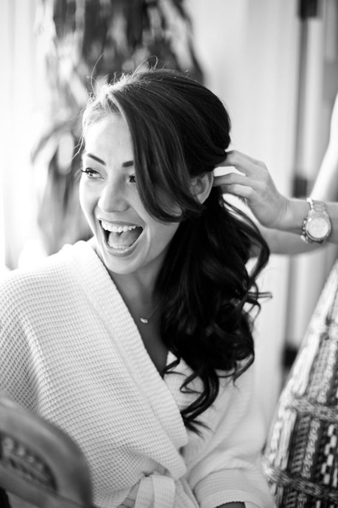 Gorgeous bride having her side ponytail styled by her hairdresser!