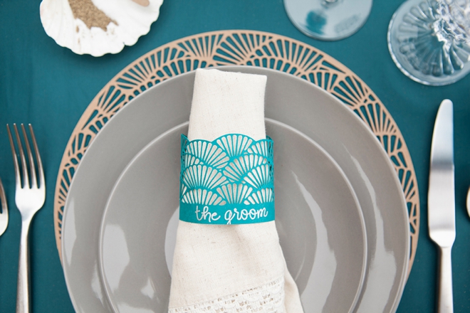 Use your Cricut Explore to make this darling scallop charger and napkin ring set, perfect for weddings!