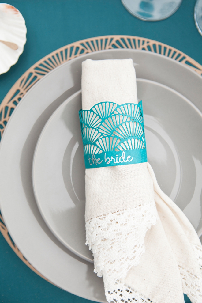 Use your Cricut Explore to make this darling scallop charger and napkin ring set, perfect for weddings!