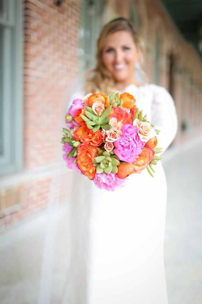 The stunning Bride and her colorful bouquet before the ceremony!