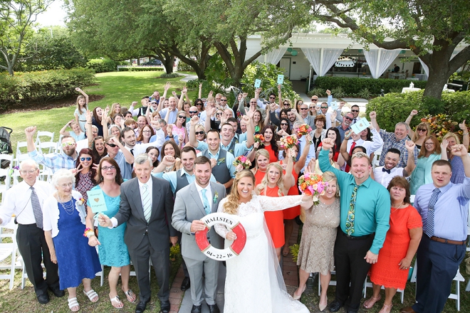 What a great photo of the Bride and Groom and their entire wedding!