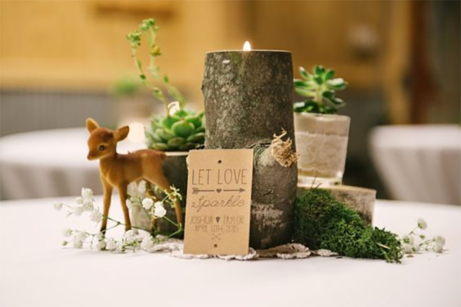 logs with candles and mini forest animals make adorable centerpieces. 