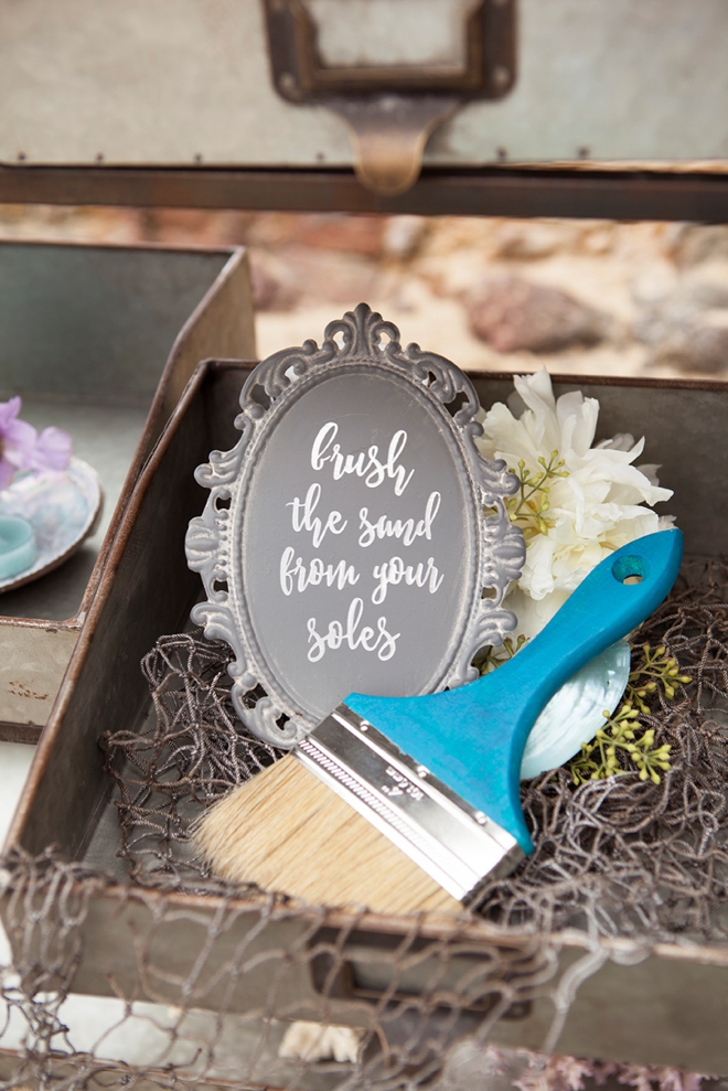 Check out this cute Brush The Sand From Your Soles beach wedding idea that you can DIY!