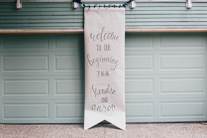 Swooning over this DIY'd giant banner wedding sign!