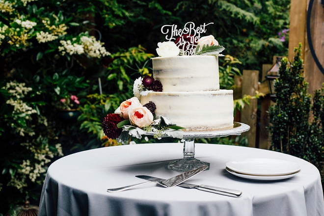 This stunning wedding cake and cake topper couldn't be more perfect!