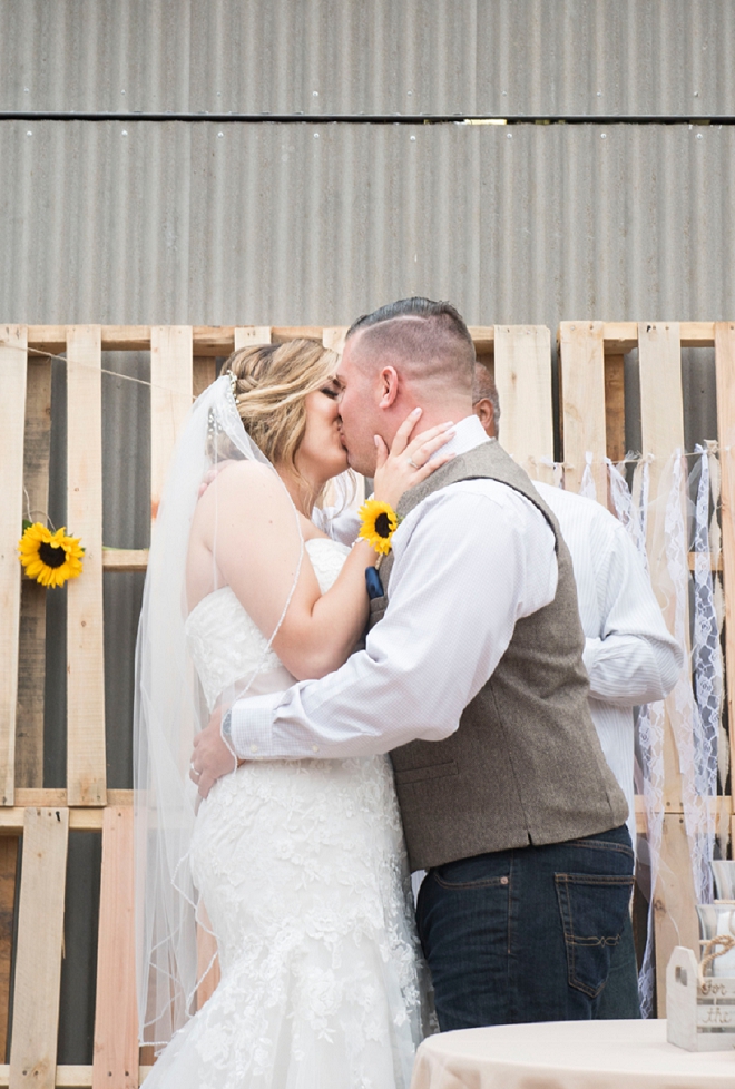 We love this first kiss as Mr. and Mrs!
