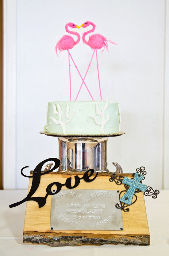 We LOVE the handmade flamingo cake topper!