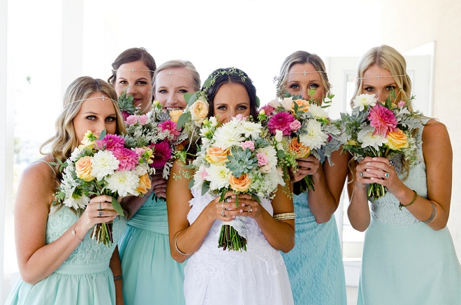 How darling is this snap of the Bride and her Bridesmaids with their super colorful bouquets?! LOVE!