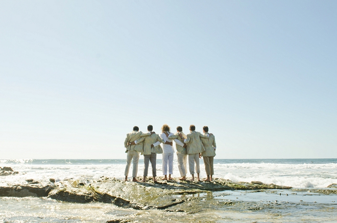 Great shot of the Groom and Groomsmen at the beach before the ceremony!
