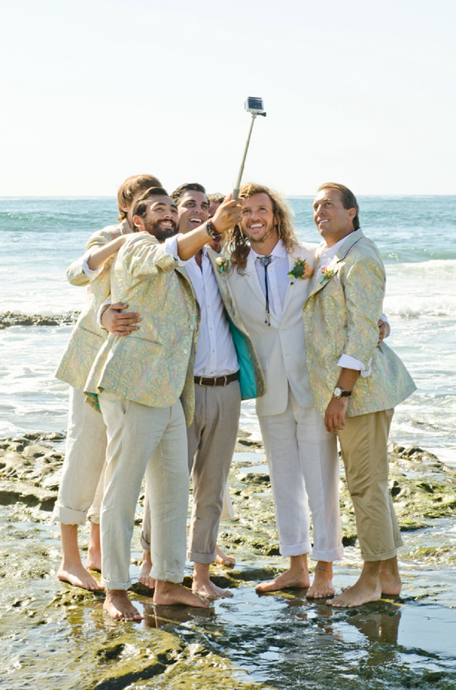 Great shot of the Groom and Groomsmen at the beach before the ceremony!