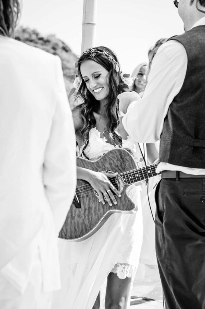 How sweet! The Bride played her Husband-to-be a quick song during the ceremony. Swoon!
