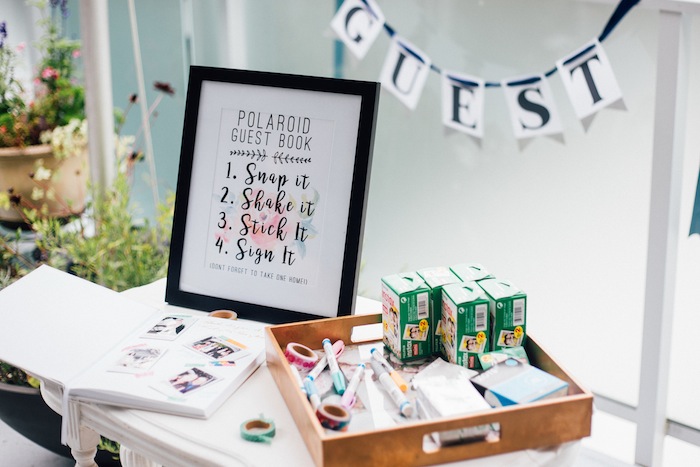 A polaroid wedding guest book! So easy and a unique guest book idea.