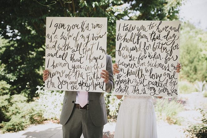 We are in LOVE with this crafty Bride's handlettered ceremony vow canvases!