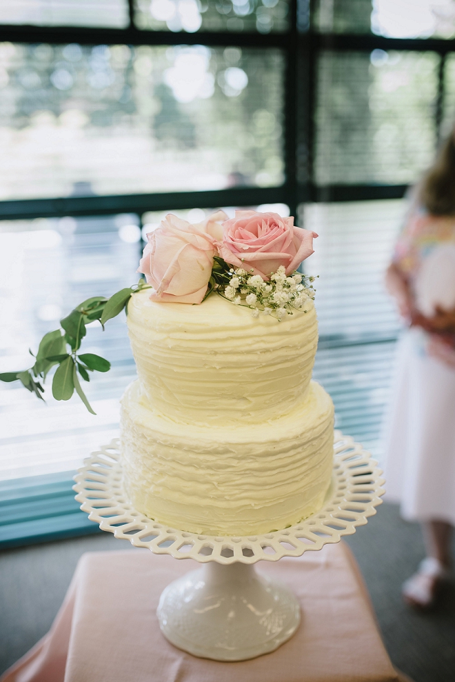 We love this darling simple wedding cake with garden rose topper! LOVE!