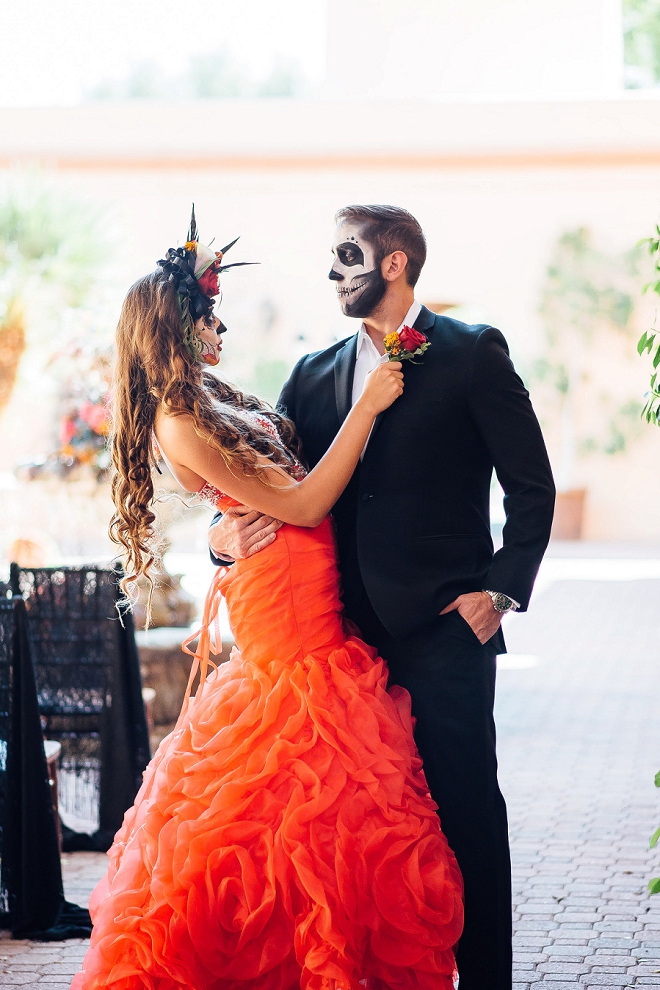Check out this stunning Day of the Dead styled wedding and this gorgeous red dress!