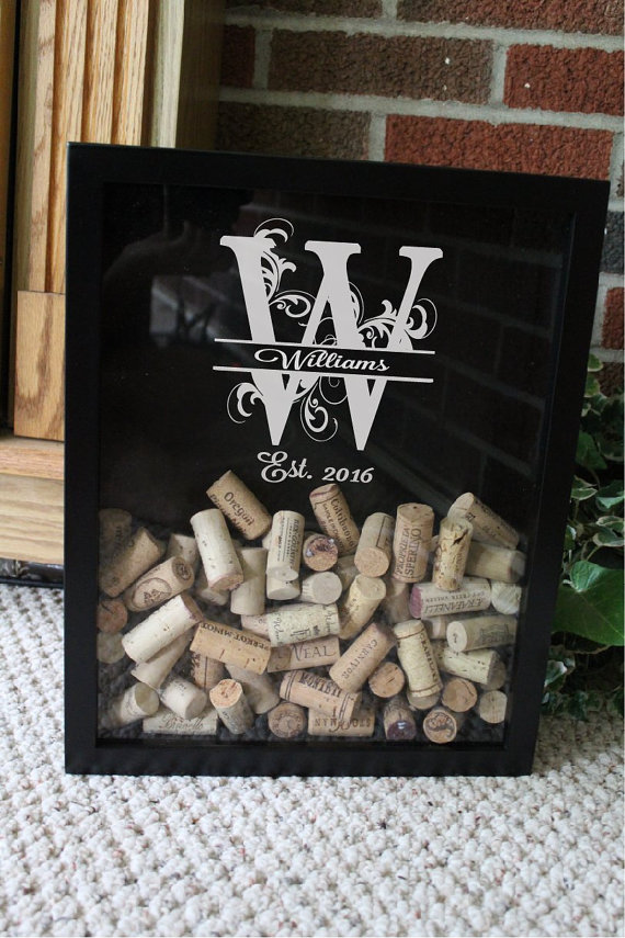 We're loving this cute wine cork keeper gift on etsy!