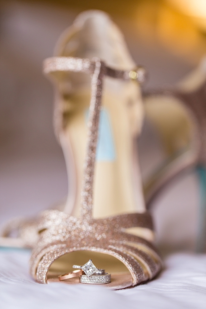 We LOVE this ring shot in the Bride's Betsy Johnson wedding shoe!