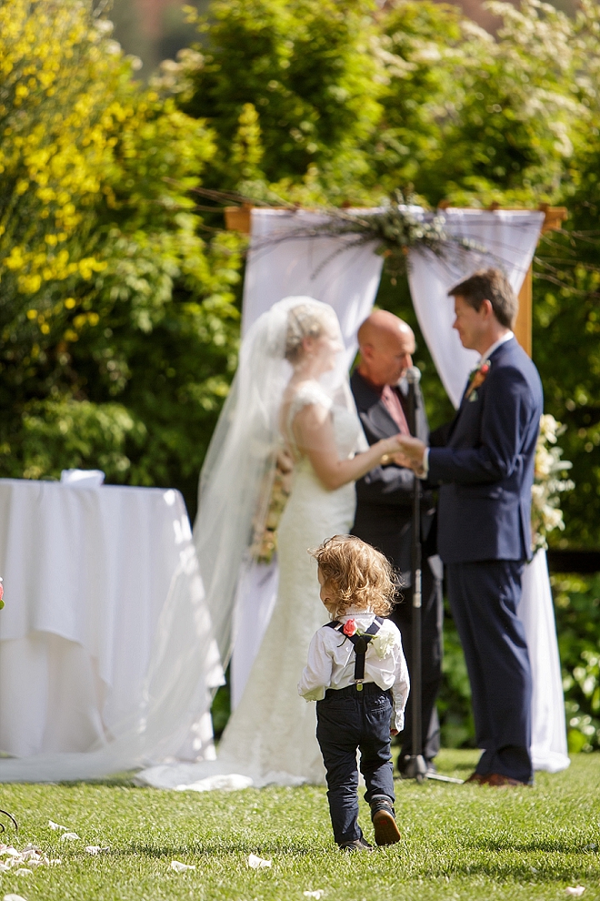 How cute is this darling ring bearer?!