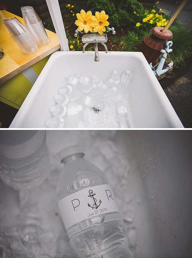 We love this bathtub full of monogrammed water at the reception!