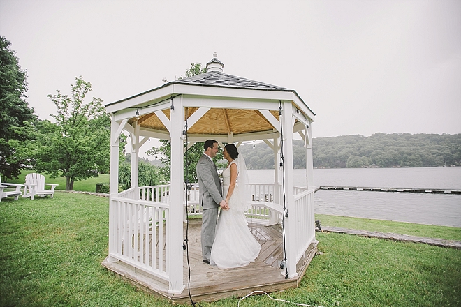 We love this super romantic first look in the lakeside gazebo!