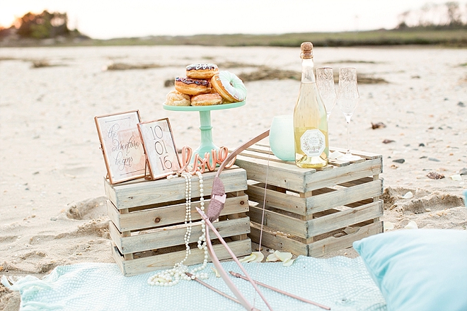 We love these darling details at this champagne beach engagement!