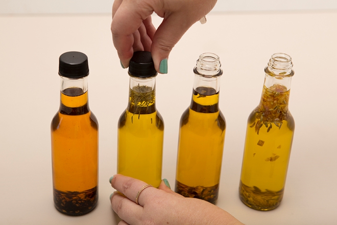 Learn how easy it is to make your own infused olive oil holiday gifts!