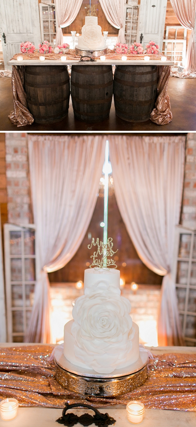 Check out this couple's stunning wedding cake with gold glitter topper!
