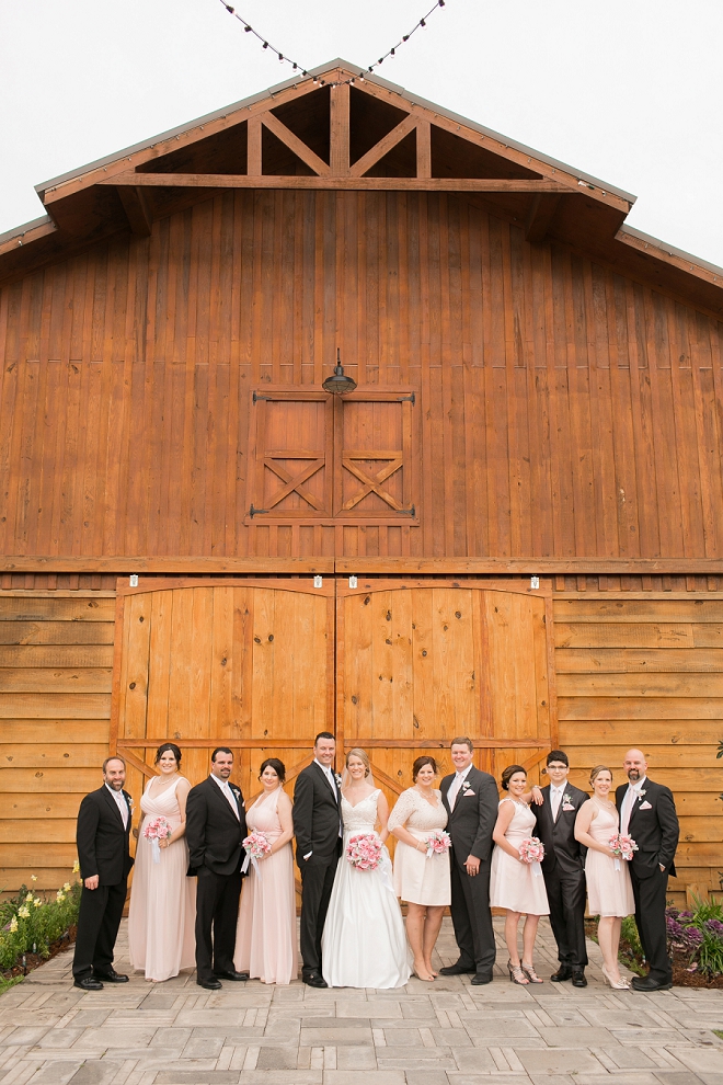 We love this cute snap of the black and blush wedding party!