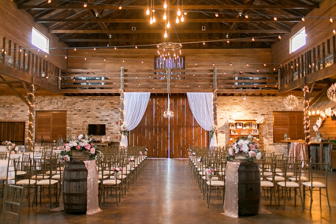 We're swooning over this rustic and romantic barn ceremony location!