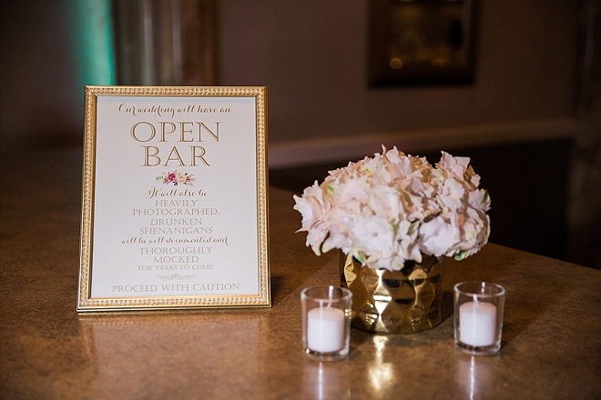 Such a cute open bar sign with cute gold accents!