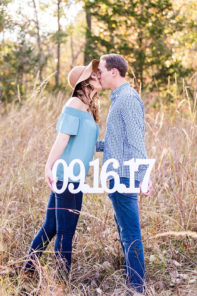 We're in love with this romantic engagement session and wedding date sign!