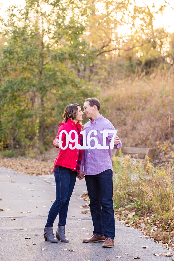 We're in love with this romantic engagement session and wedding date sign!